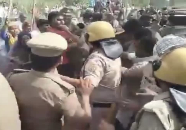 Police and villagers clash