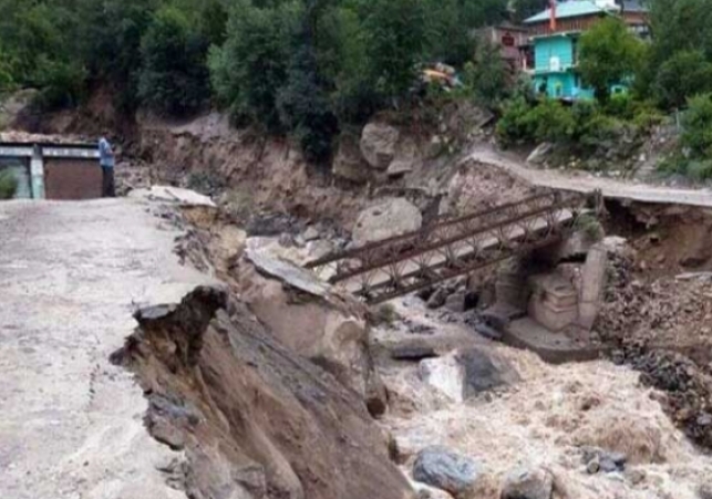 Cloud Burst in Rohru, Water and Debris Formed in the Slums Built on the Banks of the Ravine.