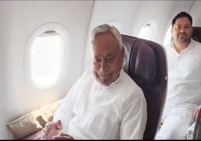 NDA Leader Nitish Kumar Tejashwi Yadav Together In Flight Video Viral